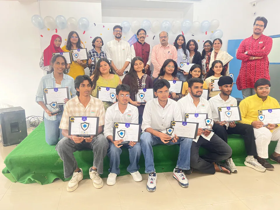 Student leaders with their awards alongside the college team